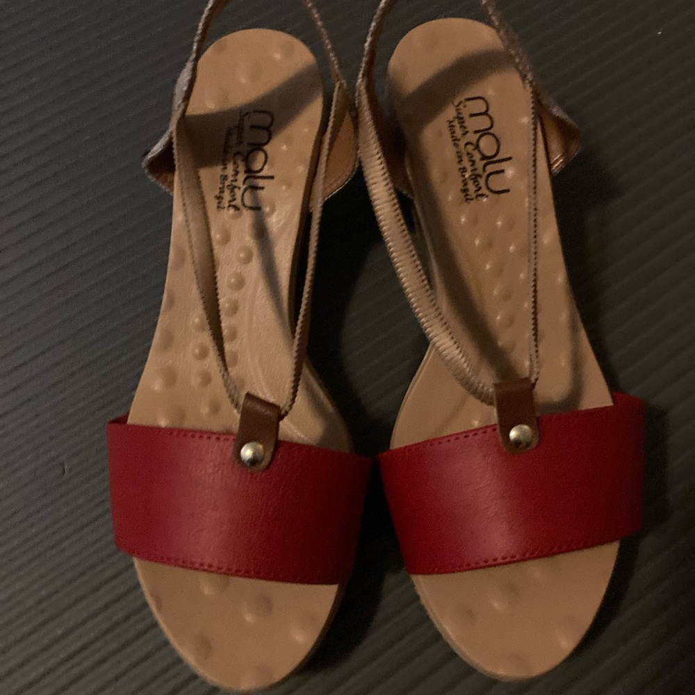 Red sandals.